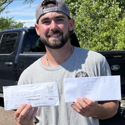 Ben Marsh with the 5 lb Big Bass Pot winnings and top Non-Boater winnings
