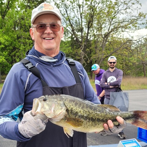 Larry Stratton with his 5.56 lb. Largemouth on Saturday and the 2nd Big Bass award winner